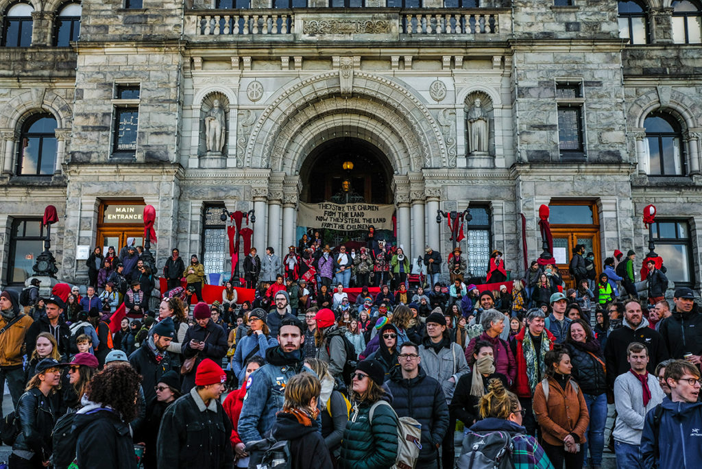 Photo of youth on steps of B.C. Legislature