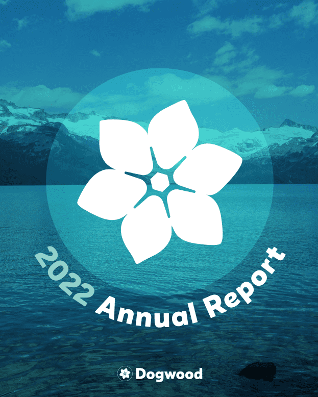 Cover of Annual report: background image of lake with snowy mountains in the distance, blue filtered, with the Dogwood flower icon in the centre middle and 2022 Annual Report written underneath.